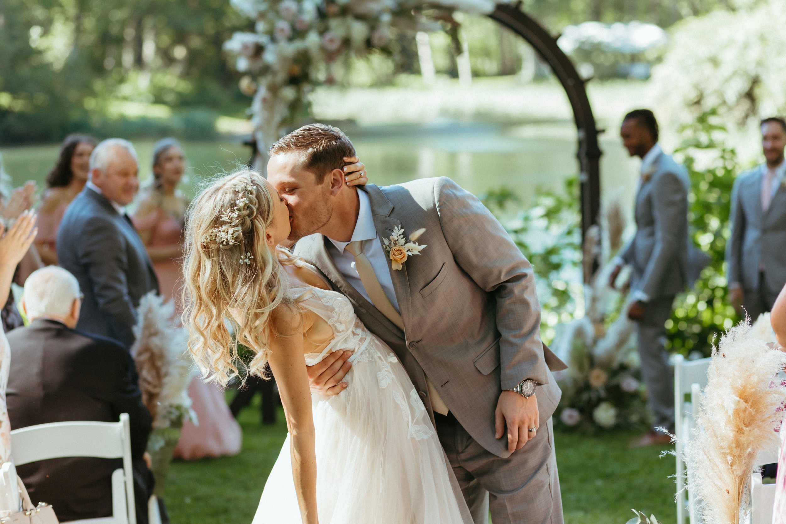 bride and groom kissing after wedding ceremony, located at bridal veil lakes in Oregon