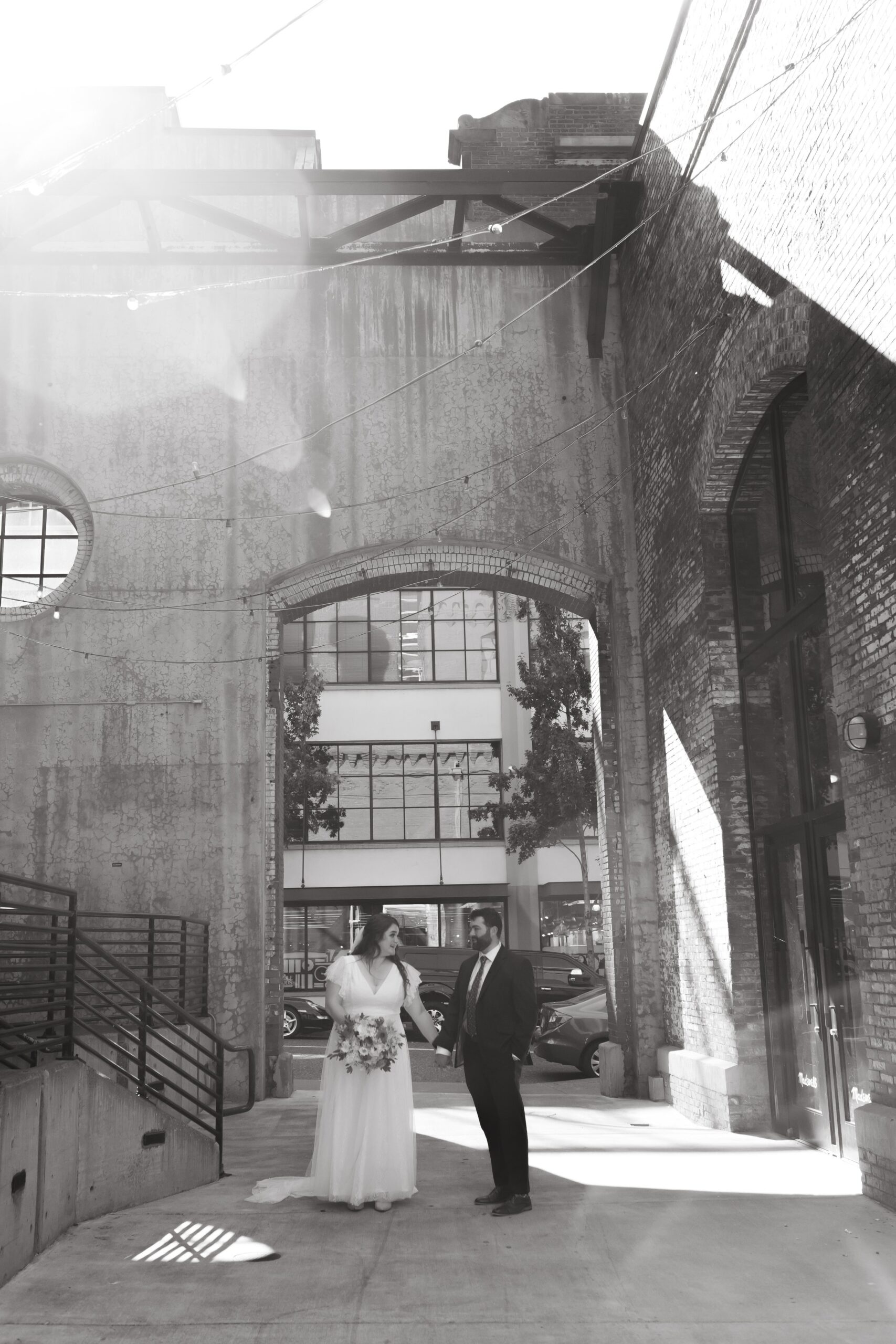  black and white city couple elopement in alley 